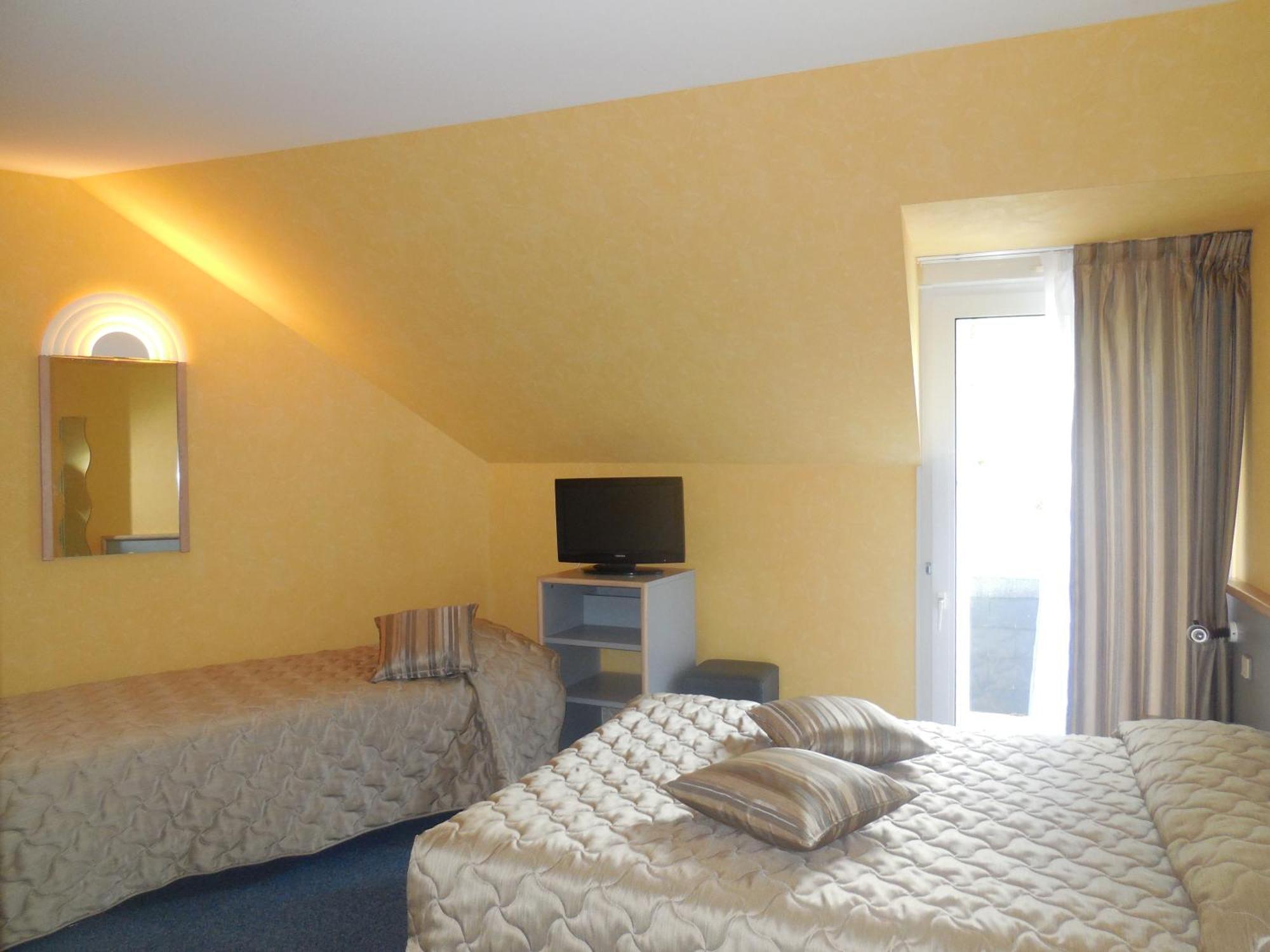 Hotel Au Relais De L'Oust Lanouée Habitación foto